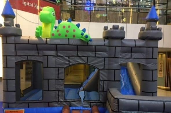 Dino Castle themed bouncy castle by BounceParkSG