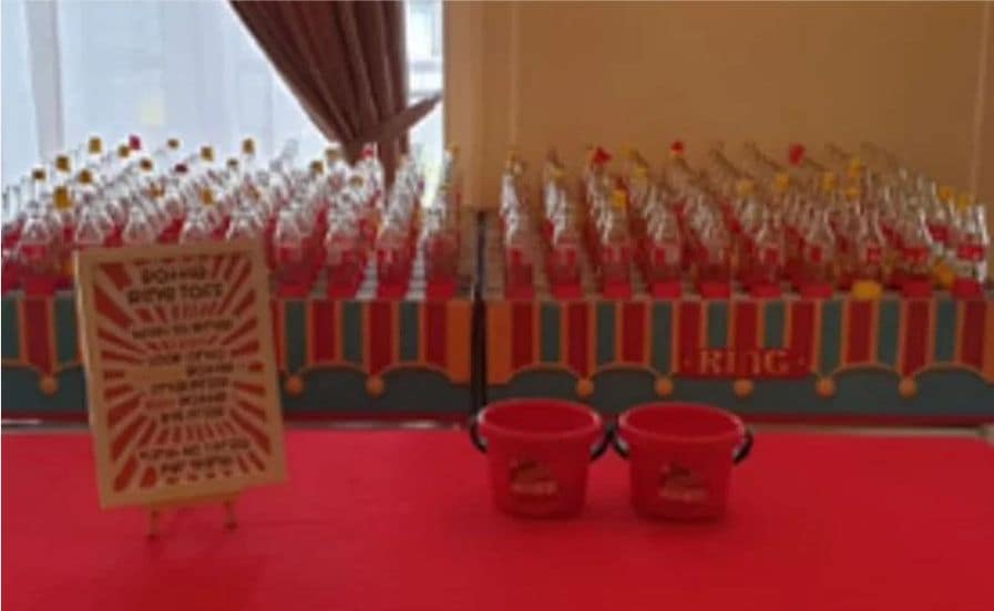 Large bottle ring toss game by BounceParkSG
