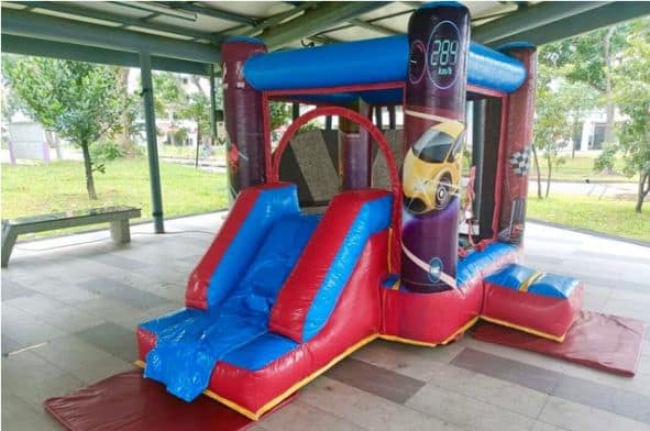 Racing themed bouncy castle by BounceParkSG