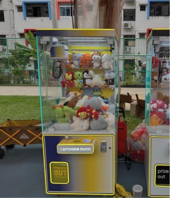 Standard claw machine arcade unit by BounceParkSG