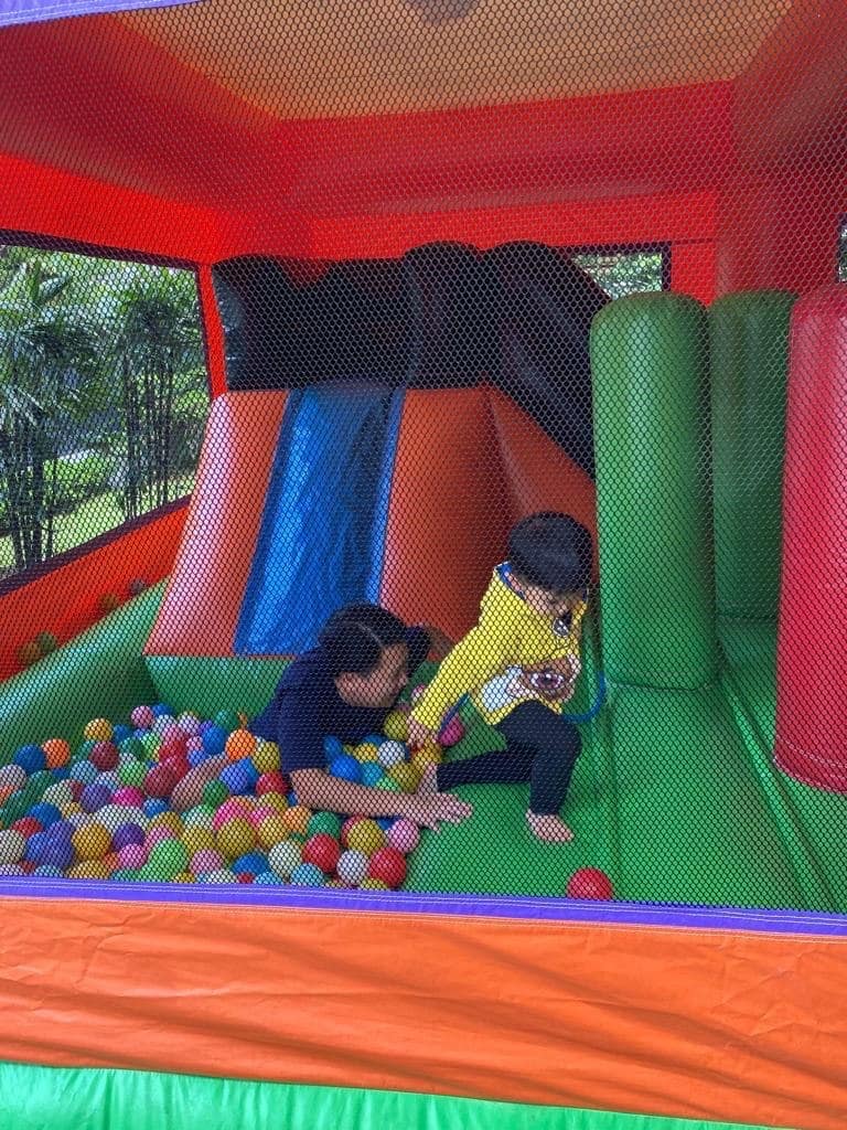 Kids playing at a pirate-ship ball pit