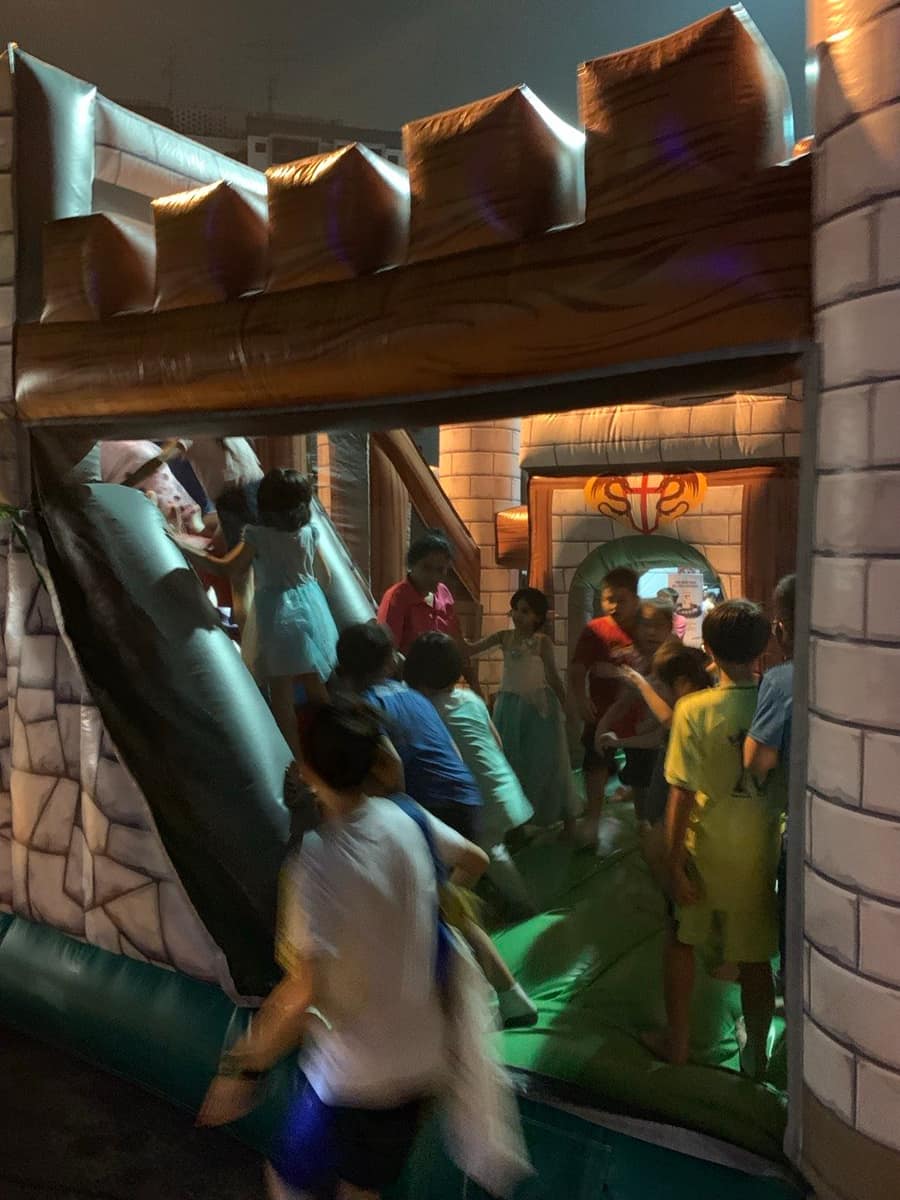 Knight's Castle bouncy castle set up indoors