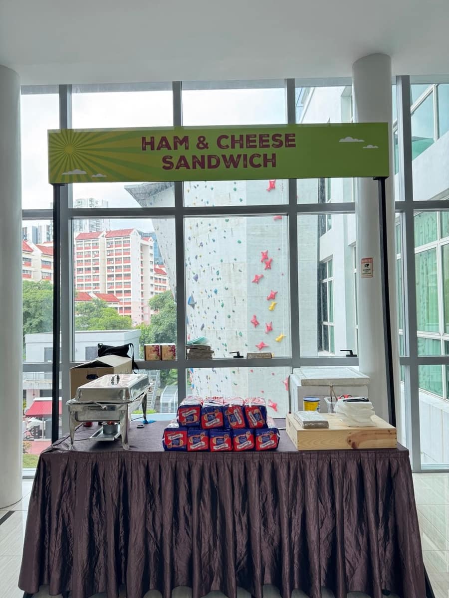 Ham and cheese sandwich station with a city skyline view