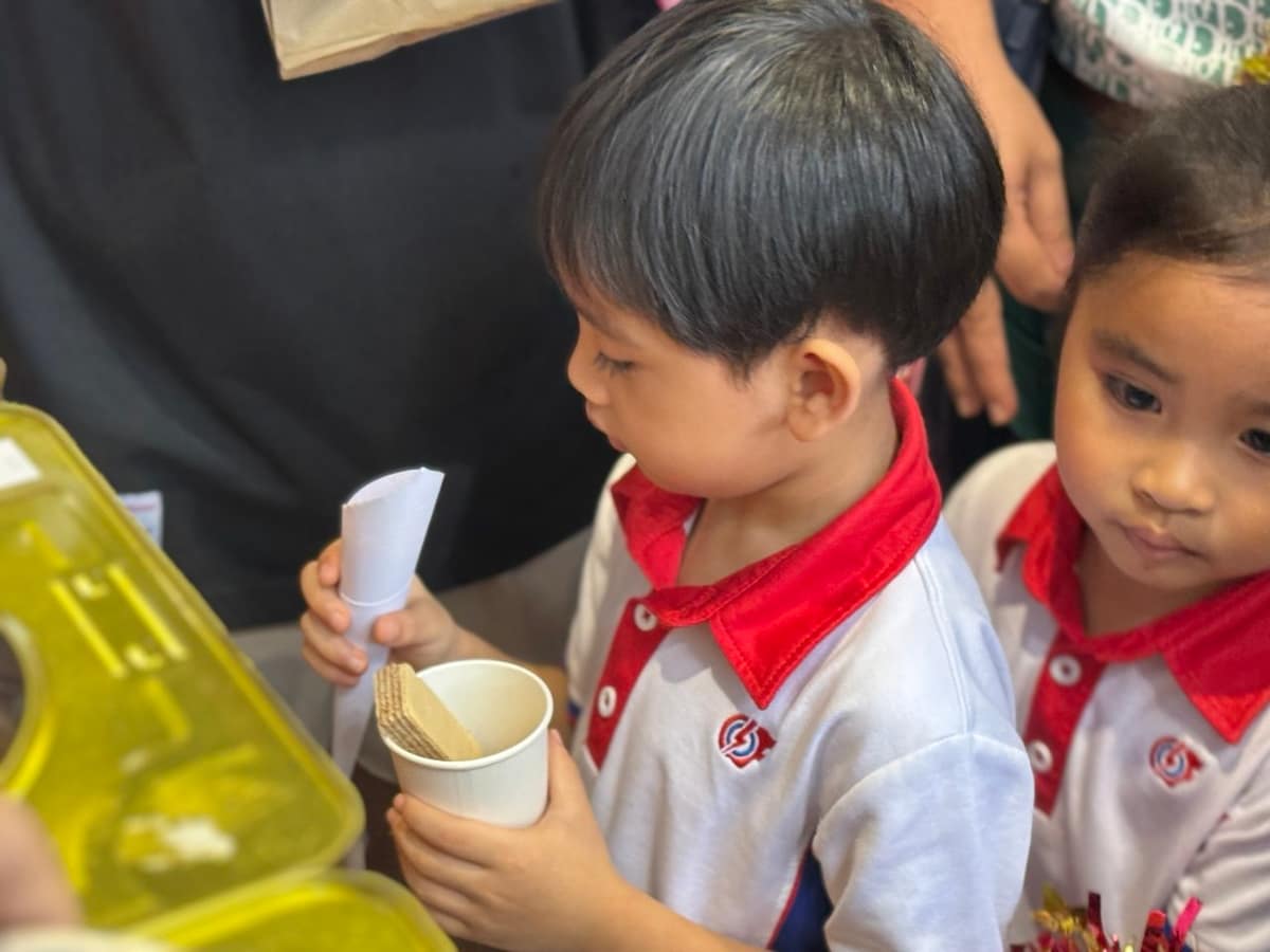 Guests at a carnival snack station