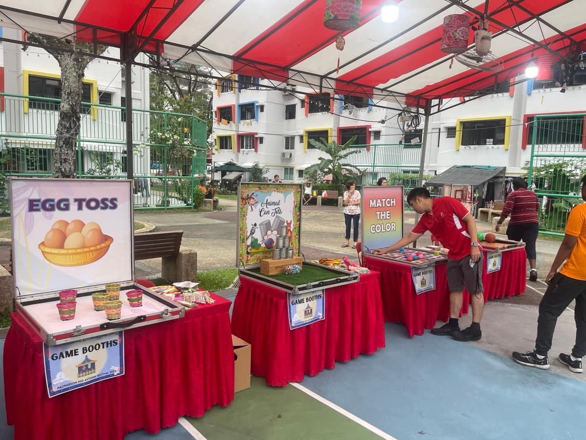 Egg toss and Match the Colour game booths
