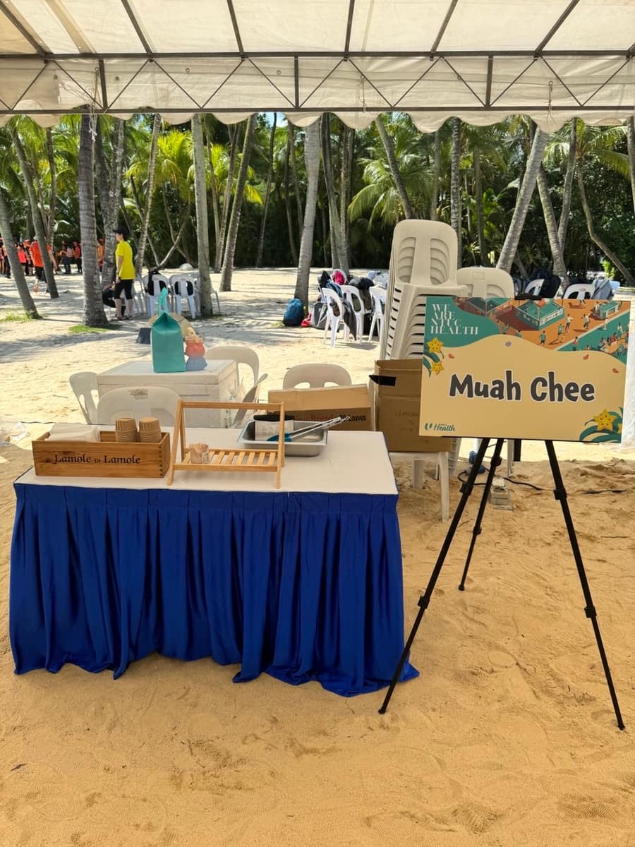 Knock-em-down carnival game at a beach event