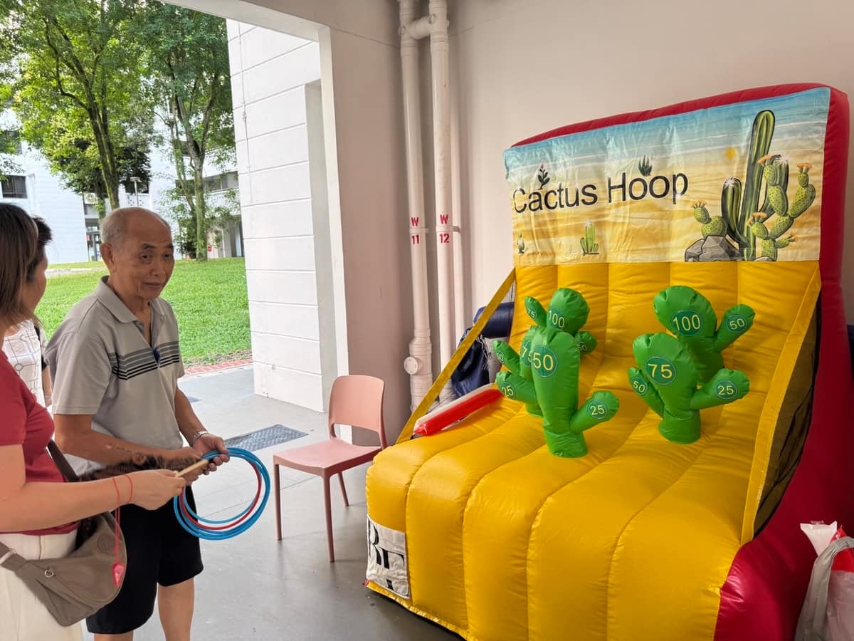 Guest playing the Cactus Ring Toss game