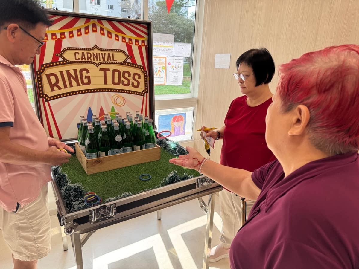 Couple playing ring toss