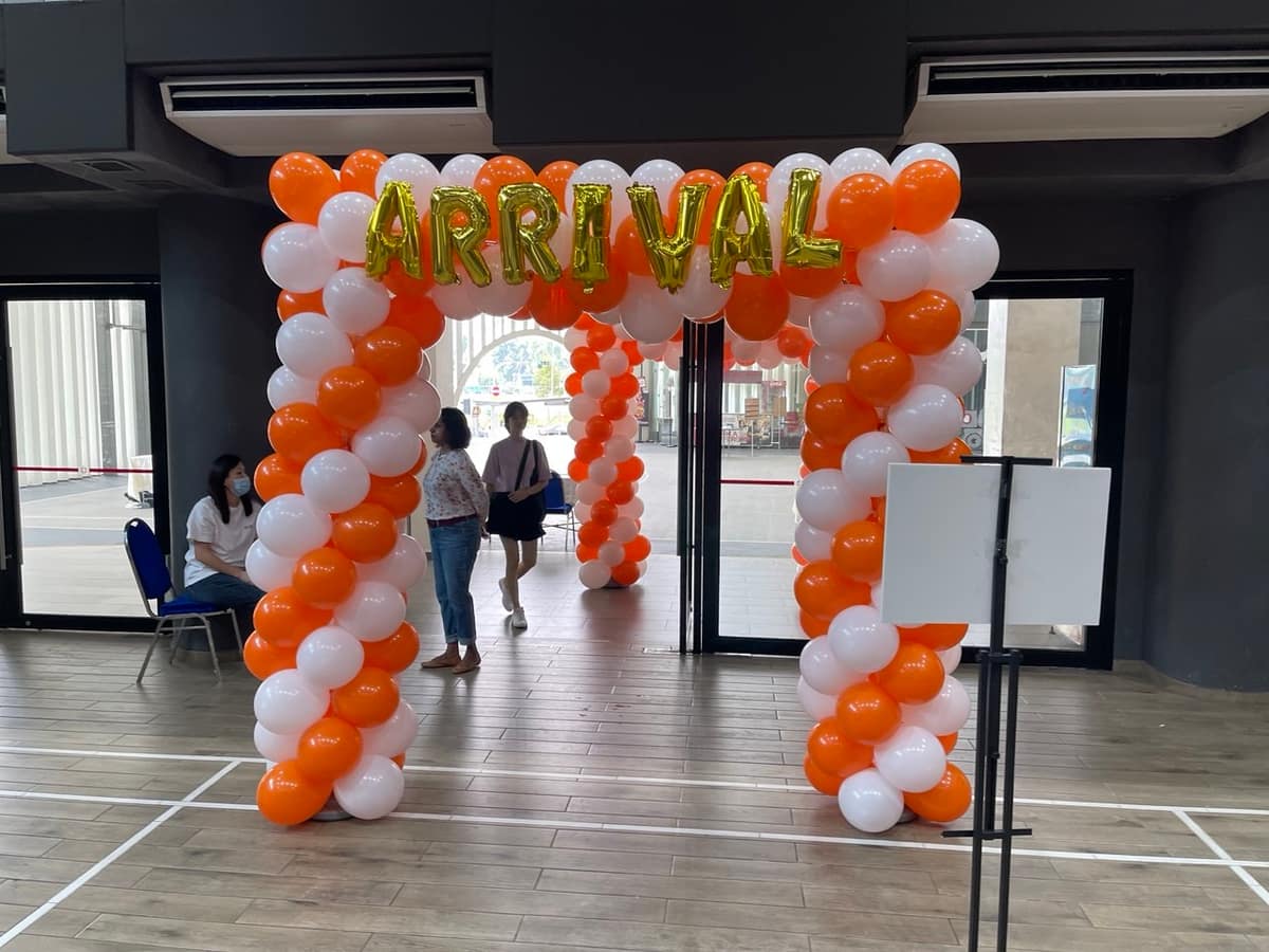 Balloon arch at an office entrance for a bring your child to work day
