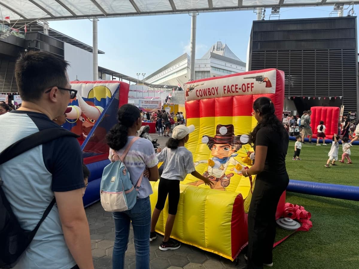Cowboy themed multi-station carnival setup