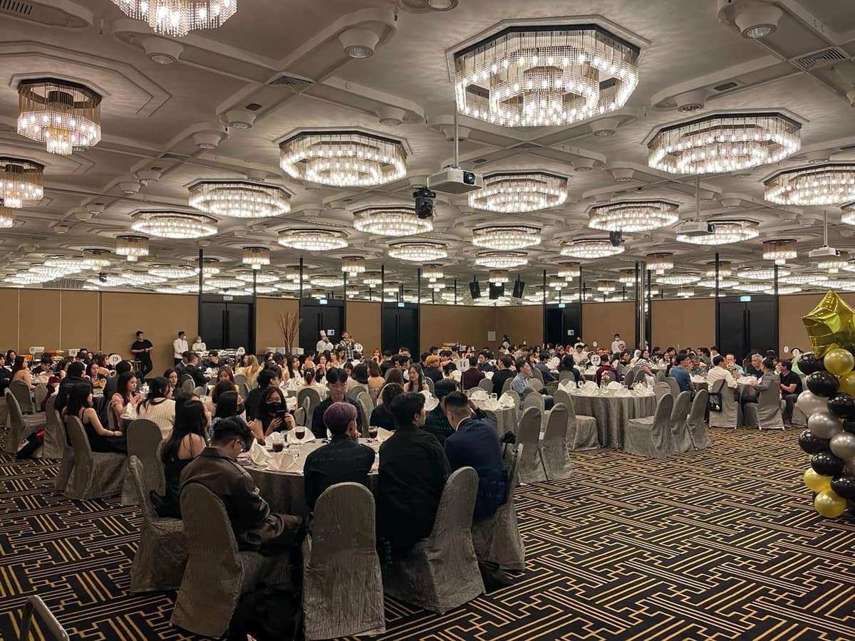 Corporate dinner and dance banquet in a grand ballroom