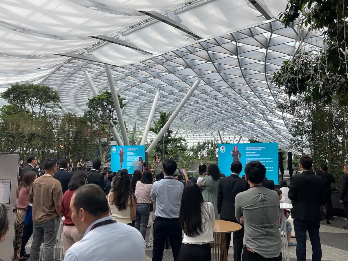 Crowd at a corporate event in an atrium