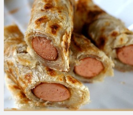 Cheese Prata Hotdog live station at a BounceParkSG event