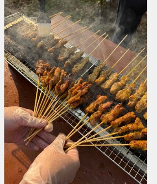 Chicken Satay live station at a BounceParkSG event