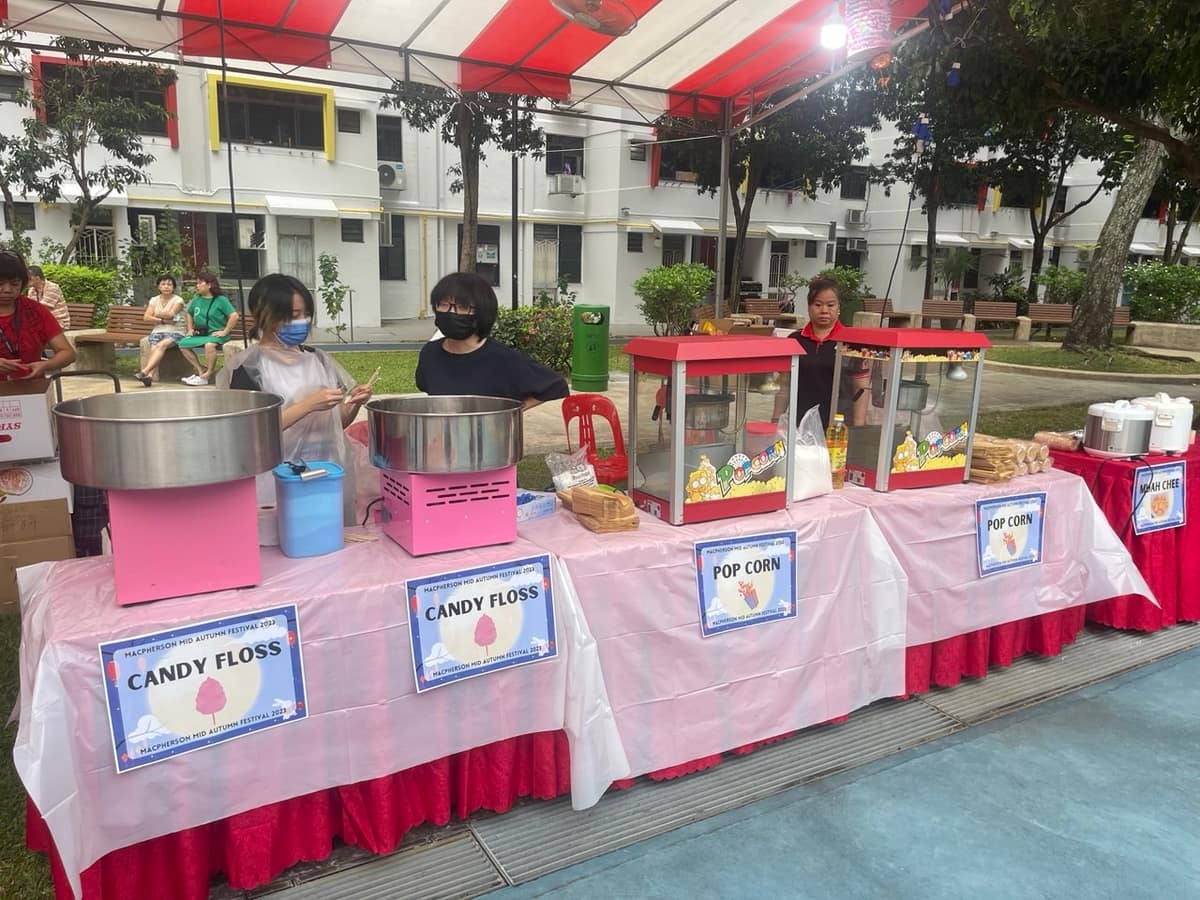 Branded candy floss cart at an event